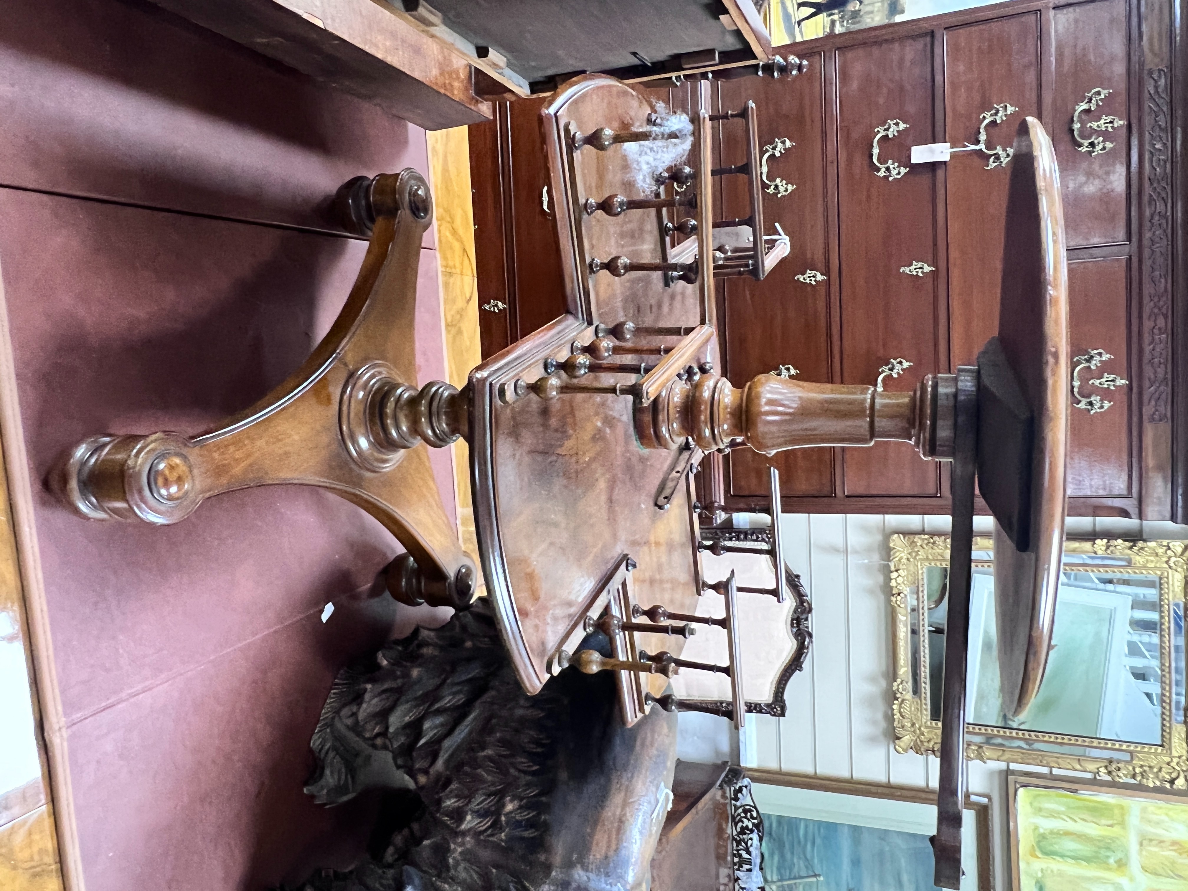 A Victorian circular walnut occasional table in need of restoration, height 70cm